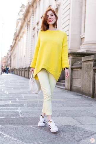 Women's Yellow Oversized Sweater, Yellow Jeans, White Leather Low Top Sneakers, White Leather Tote Bag