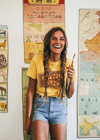 Embroidered Denim Shorts Hot Weather Outfits For Women: Infuse a relaxed touch into your day-to-day repertoire with a yellow print crew-neck t-shirt and embroidered denim shorts.