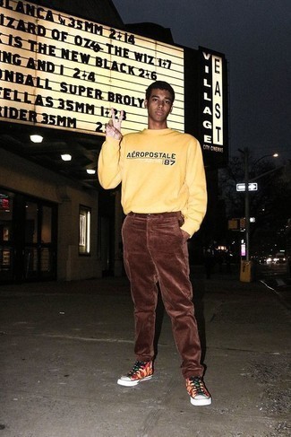 Men's Yellow Print Sweatshirt, Brown Corduroy Chinos, Multi colored Print Canvas High Top Sneakers