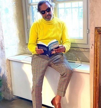 Mustard Knit Wool Turtleneck Outfits For Men: Such essentials as a mustard knit wool turtleneck and multi colored houndstooth wool chinos are an easy way to infuse extra cool into your day-to-day fashion mix. Make a bit more effort with shoes and add tobacco leather loafers to your ensemble.