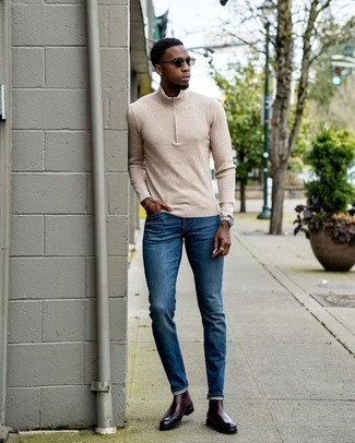 Zip Neck Sweater Outfits For Men: Such pieces as a zip neck sweater and navy jeans are the perfect way to introduce extra cool into your current styling routine. If you need to instantly amp up your look with one single piece, complement your getup with a pair of burgundy leather chelsea boots.
