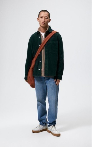 Mustard Canvas Messenger Bag Outfits: If you like a more casual approach to menswear, why not try pairing a tan zip neck sweater with a mustard canvas messenger bag? Feeling inventive? Switch things up by rounding off with grey suede low top sneakers.