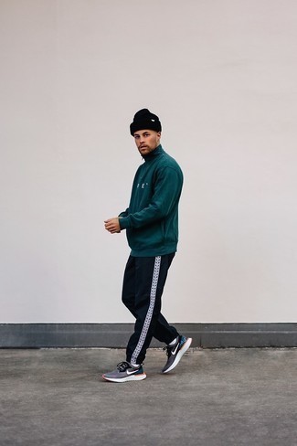 Teal Zip Neck Sweater Outfits For Men: A teal zip neck sweater and navy sweatpants matched together are a match made in heaven. If you need to immediately play down your ensemble with a pair of shoes, why not introduce a pair of charcoal athletic shoes to your outfit?