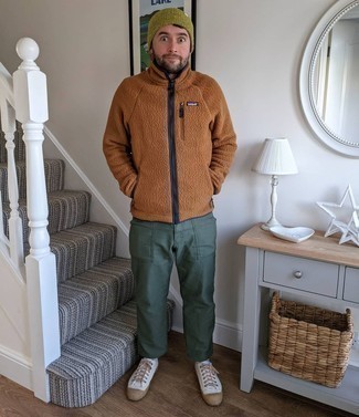 Zip Sweater Outfits For Men: The ideal choice for a killer casual ensemble for men? A zip sweater with dark green chinos. White canvas low top sneakers are an effortless way to give a sense of stylish effortlessness to this outfit.