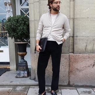 White Zip Sweater Outfits For Men: If you're looking for an off-duty but also sharp ensemble, pair a white zip sweater with black chinos. For something more on the smart end to round off this outfit, introduce a pair of black leather tassel loafers to the mix.