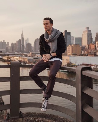 Black Canvas High Top Sneakers Outfits For Men: If it's ease and practicality that you're looking for in an outfit, marry a dark brown fleece zip sweater with burgundy jeans. For something more on the daring side to round off this outfit, go for black canvas high top sneakers.