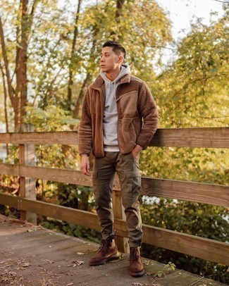 Brown Fleece Zip Sweater Outfits For Men: Reach for a brown fleece zip sweater and olive cargo pants for a comfy look that's also put together. Introduce a pair of brown suede casual boots to the mix to avoid looking too casual.