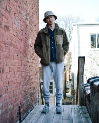 Grey Bucket Hat Outfits For Men: For an off-duty getup, pair an olive fleece zip sweater with a grey bucket hat — these two items fit really nice together. Grey athletic shoes tie the ensemble together.