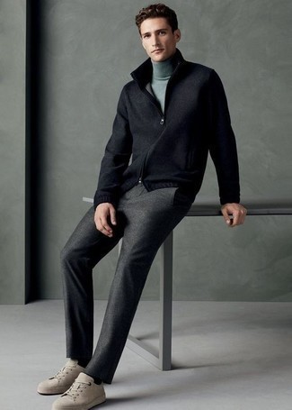 Black Zip Sweater Outfits For Men: This pairing of a black zip sweater and charcoal wool chinos is irrefutable proof that a safe casual look doesn't have to be boring. Bump up the wow factor of this outfit by slipping into beige suede low top sneakers.
