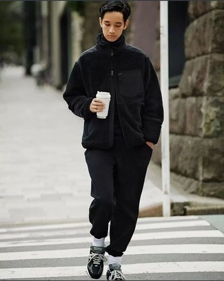 Black Zip Sweater Outfits For Men: Try teaming a black zip sweater with black chinos for a simple ensemble that's also pulled together nicely. Feeling bold? Spice things up by slipping into black athletic shoes.