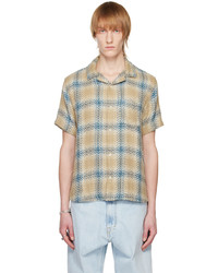 Men's Multi colored Plaid Long Sleeve Shirt, Black Tank, Light Blue Ripped  Jeans, White and Blue Canvas Low Top Sneakers