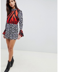 ASOS DESIGN Playsuit With Frill Hem And Tie Back In Mixed Print