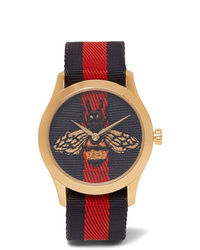 Gucci Gold Tone And Striped Webbing Watch