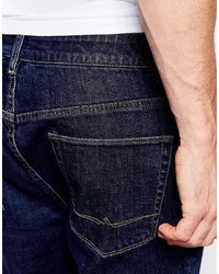 Asos Brand Stretch Slim Tapered Jeans In Indigo