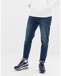 ASOS DESIGN Tapered Jeans In Dirty Blue Wash