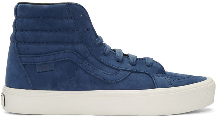 navy blue and white high top vans