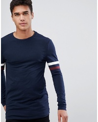 ASOS DESIGN Muscle Fit Longline Long Sleeve T Shirt With Contrast Sleeve Panels In Navy