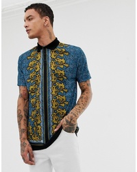 ASOS DESIGN Relaxed Longline Polo In Blue Leopard Print With Baroque Border Print
