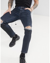 ASOS DESIGN Skinny Jeans In Overdyed Black With Knee Rips And Raw Hem