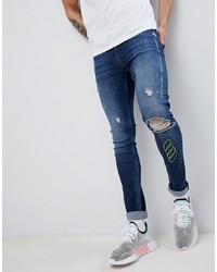 ASOS DESIGN Extreme Super Skinny Jeans In Dark Wash Blue With Rips And Embroidery