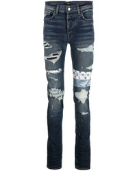 Amiri Patchwork Distressed Slim Jeans