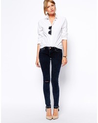 Asos Petite Whitby Low Rise Skinny Jeans In Alaska Wash With Ripped Knee