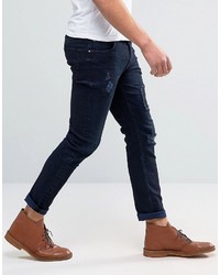 Asos Skinny Jeans With Rip And Repair In Dark Blue