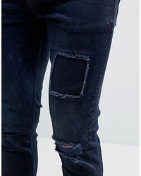 Asos Skinny Jeans With Rip And Repair In Dark Blue