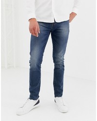 ASOS DESIGN 125oz Skinny Jeans In Smokey Blue With Raw Hem