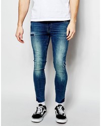 Asos Brand Extreme Super Skinny Jeans In Cropped Length With Raw Hem And Abrasions