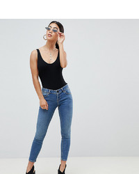 Asos Petite Asos Design Petite Whitby Low Rise Skinny Jeans In Mid Blue Wash