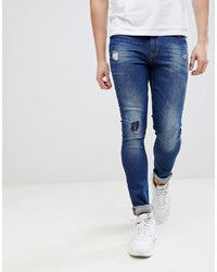 ASOS DESIGN Asos Super Skinny Jeans In Dark Wash Blue With Abrasions