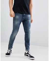Calvin Klein Jeans Skinny Tapered Jeans In Blue