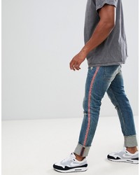 ASOS DESIGN Super Skinny Jeans In Mid Wash With Rips And