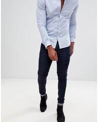 ASOS DESIGN Super Skinny Jeans In Raw Blue