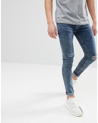 ASOS DESIGN Super Skinny Jeans In Smokey Overdyed Blue With Knee Rips