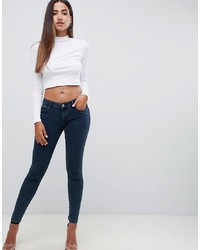 ASOS DESIGN Whitby Low Waist Skinny Jeans In Dark Stonewash Blue With Rip And Repair