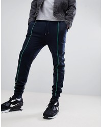 ASOS DESIGN Skinny Joggers In Navy With Light Green Piping Spring Green