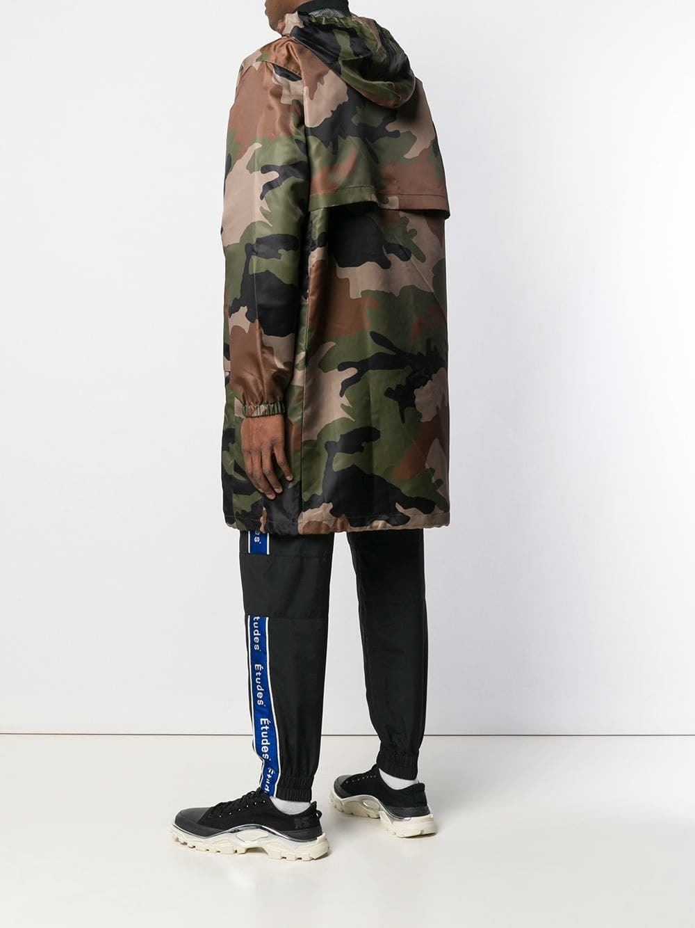 Études Air Europa Camouflage Parka, $215 | farfetch.com | Lookastic