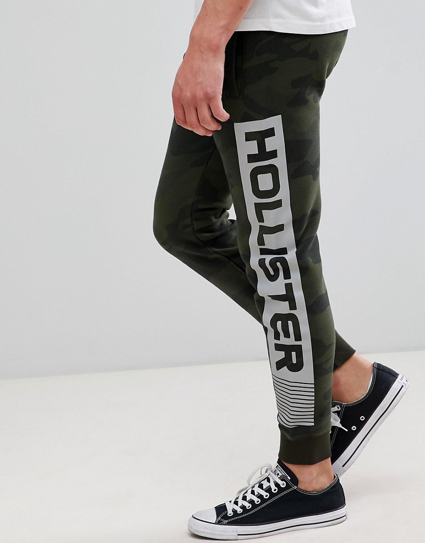presidente patrulla dulce Hollister Print Logo Camo Print Skinny Joggers In Olive Green Camo, $29 |  Asos | Lookastic