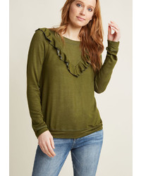 Mct1406 Casual And Chic Are Your Favorite Fashion Related Words And This Heather Olive Green Pullover Combines The Two Flawlessly Flaunting A Super Soft Jersey Knit And A Super Cute Ruffle Creating A V On The Front And Back This Cute Crew Neck From Our M