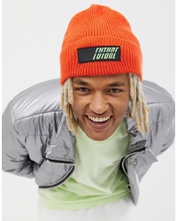 ASOS DESIGN Oversized Beanie In Orange With Rubber Badge Detail