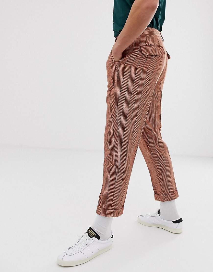 orange tapered trousers