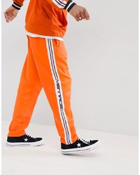 Mennace Jogger In Orange With Taping