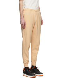 Nike Orange Revival Fleece Lounge Pants