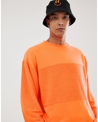 ASOS DESIGN Oversized Sweatshirt With Reverse Panel In Neon Orange