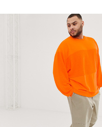 ASOS DESIGN Plus Oversized Sweatshirt With Reverse Panel In Neon Orange