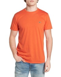 orange lacoste shirt