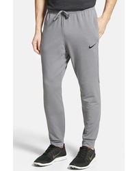 pantalones nike gris