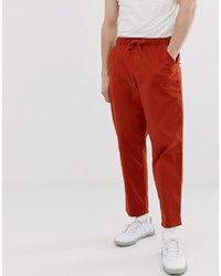 ASOS DESIGN Relaxed Chinos With Elastic Waist In Rust